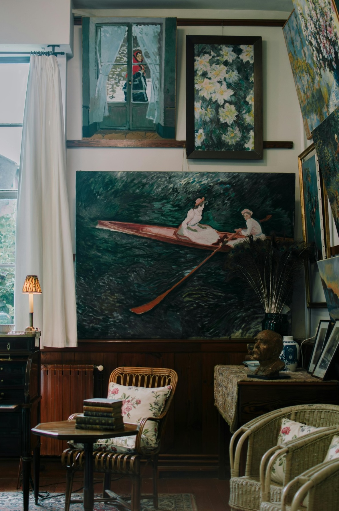 collector's house with several works installed in a salon style.