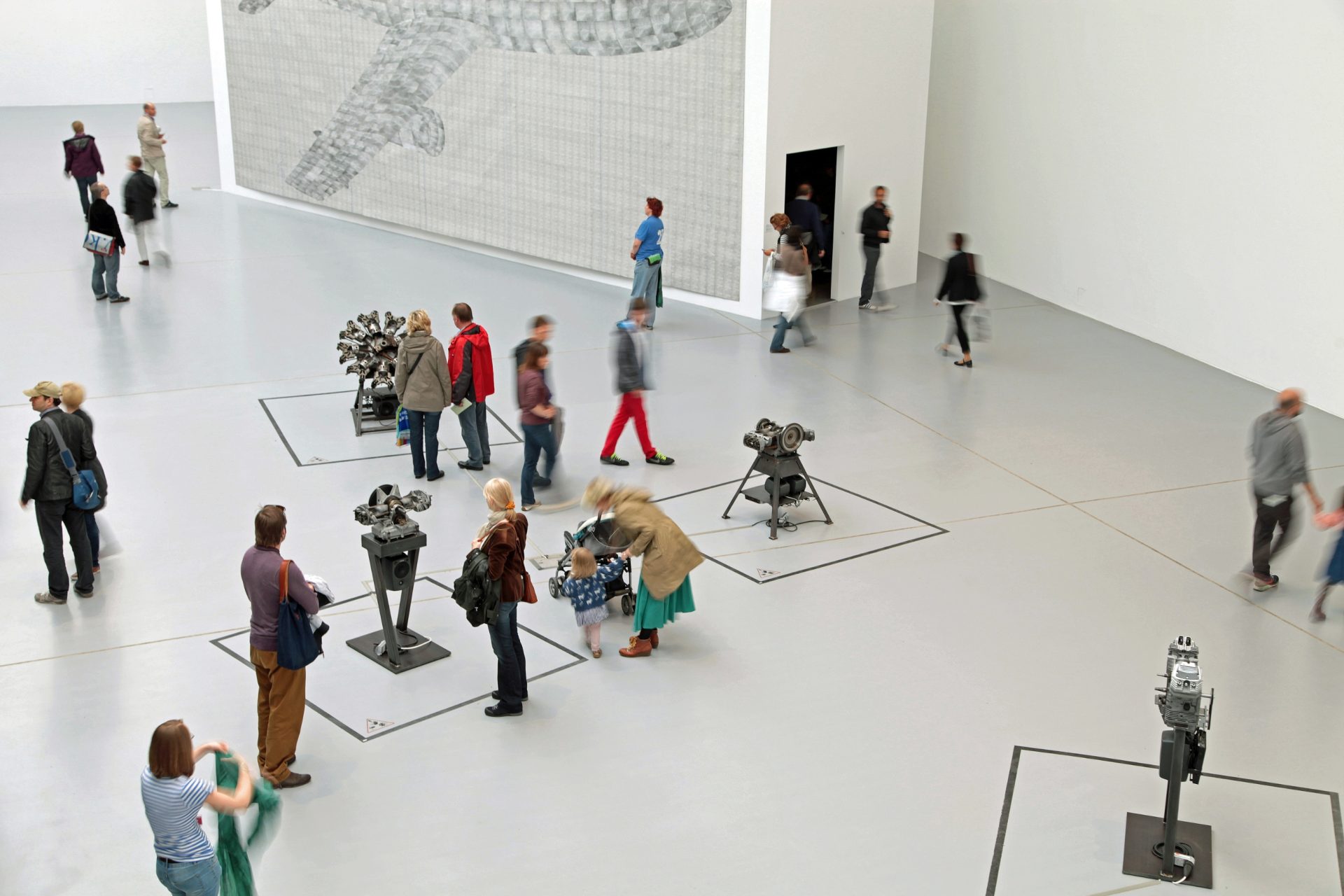 museum installation of moving sculptures from an above view.