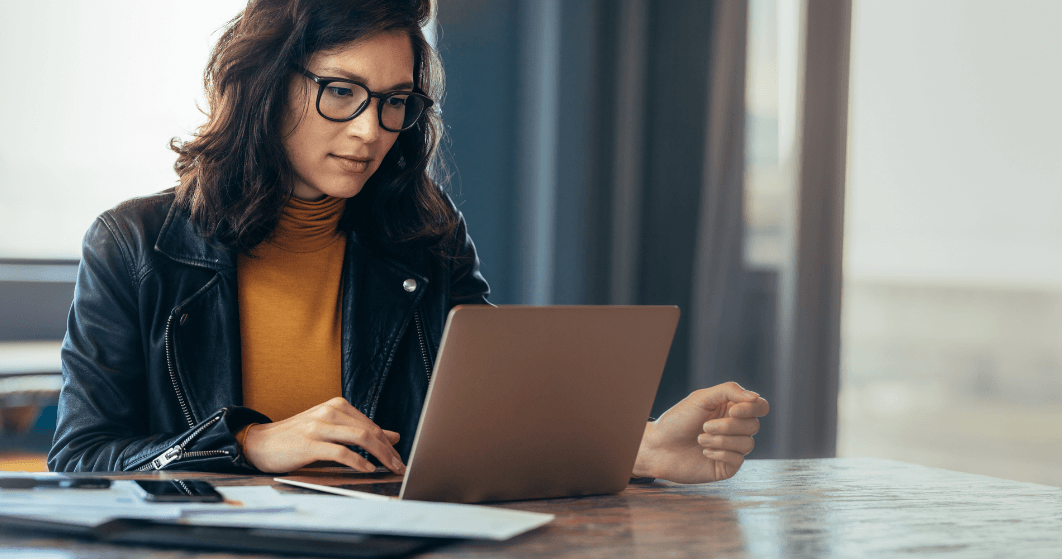 Gallery professional using a laptop