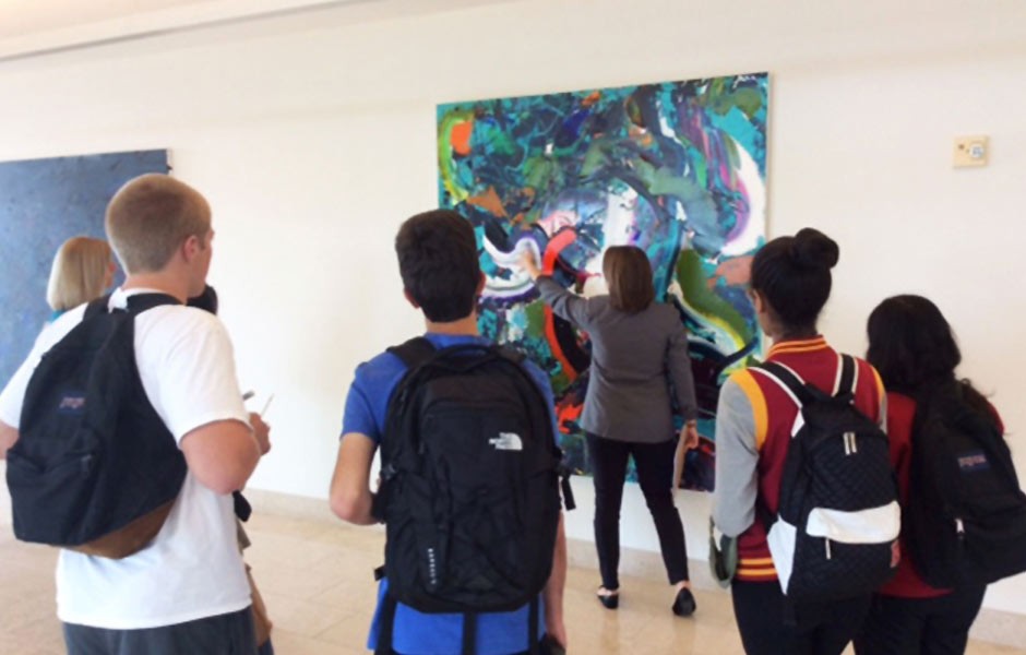 Student tour discussing Michael Reafsnyder, Floating, Chapman University campus, Orange, CA.